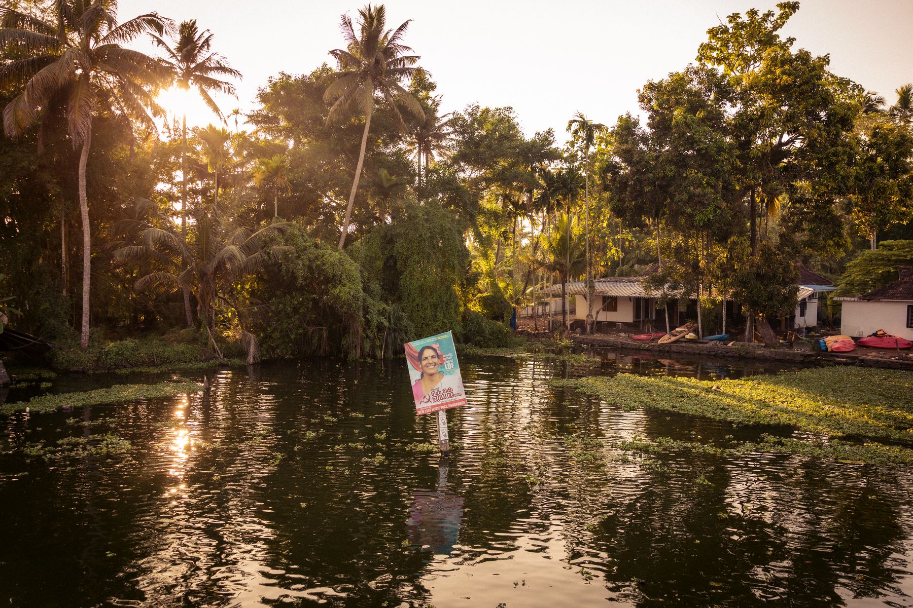 Kerala Canal With Political Campaign Sign